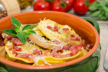 Ravioli with mushrooms and bacon, Italian cuisine 