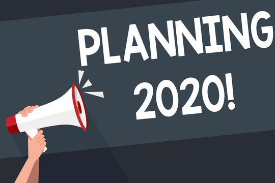 Word writing text Planning 2020. Business photo showcasing process of making plans for something next year Human Hand Holding Tightly a Megaphone with Sound Icon and Blank Text Space