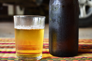 glass of beer on table in cafe
