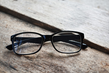 sunglasses on wooden table