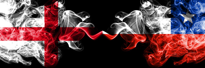 English vs Chile, Chilean smoky mystic flags placed side by side. Thick colored silky smokes flag of England and Chile, Chilean.