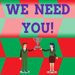 Writing note showing We Need You. Business concept for asking someone to work together for certain job or target Man and Woman Business Suit Holding Championship Trophy Cup