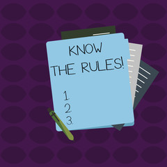 Word writing text Know The Rules. Business photo showcasing set explicit or regulation principles governing conduct Colorful Lined Paper Stationery Partly into View from Pastel Blank Folder