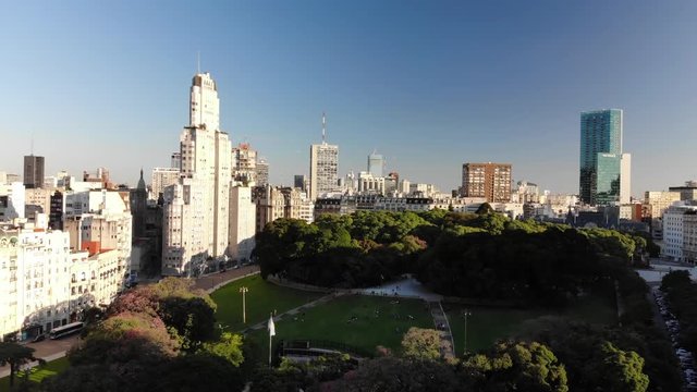 Aerial panoramic view of Plaza General San Mart&iacute;n in Retiro Neighborhood, Buenos Aires, Argentina. Drone flying foreward
