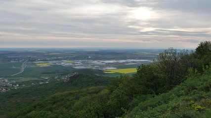 Fototapeta premium View of industrial park north of Nitra city, central Slovakia, from Zobor hill. This is industrial zone where Slovak Jaguar Land Rover facility is located. 