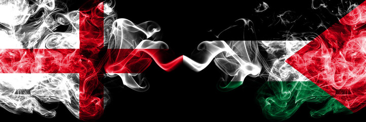 English vs Palestine, Palestinian smoky mystic flags placed side by side. Thick colored silky smokes flag of England and Palestine, Palestinian.