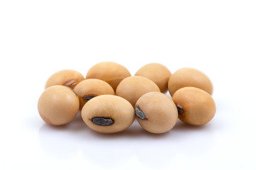 Pile of soy beans seeds isolated on white background. Selective focus. 