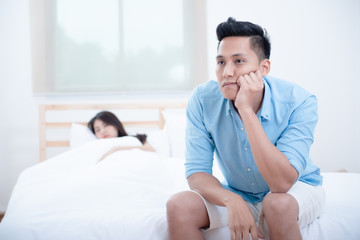 Husband unhappy and disappointed in the erectile dysfunction during sex while his wife sleeping on...