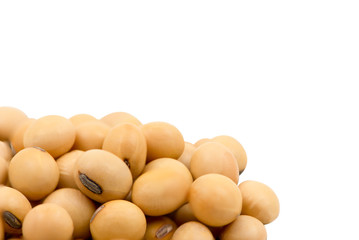Pile of soy beans seeds isolated on white background. Selective focus. Clipping path.