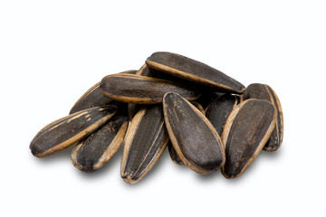 Sunflower seeds isolated on white background. Selective focus.