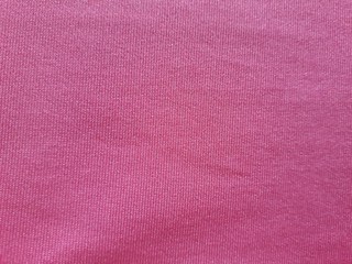 Pink background fabric Swaying like a silk thread when hit by the wind.