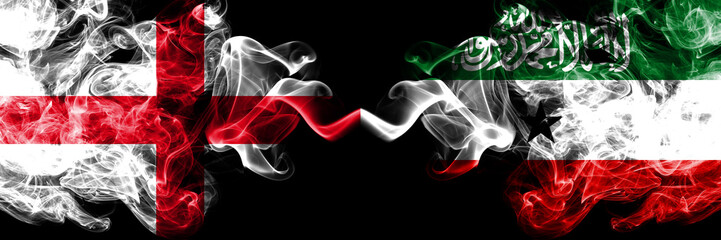 English vs Somaliland smoky mystic flags placed side by side. Thick colored silky smokes flag of England and Somaliland.