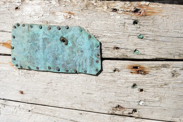 Metal rusty patch for a wooden barrel