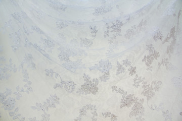 Obraz premium Beautiful embroidery pattern used as a component in bridal gown