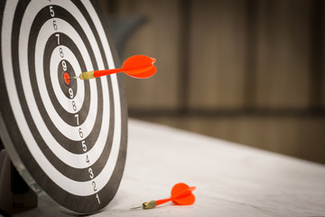 Red dart target arrow hitting on bullseye with,Target marketing and business success concept - Image