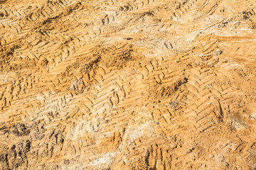 wheel tire tracks on the sand in a quarry
