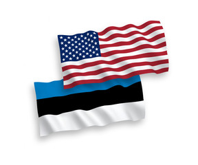 National vector fabric wave flags of Estonia and America isolated on white background. 1 to 2 proportion.