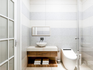 Fototapeta na wymiar Modern bathroom in the home with smart toilet and shower, as well as sink and mirror