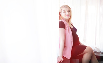 Pregnant young beautiful girl on the ninth month