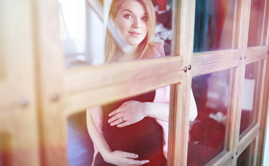 Pregnant young beautiful girl on the ninth month