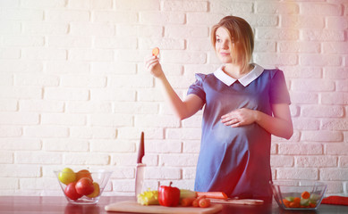Pregnant young beautiful girl on the ninth month