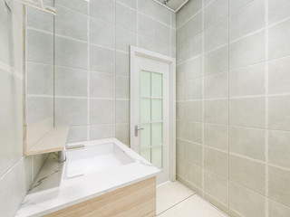 Bathroom and bathroom with glass partition
