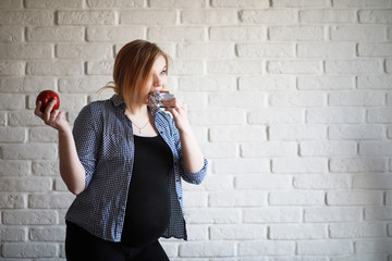 Pregnant young beautiful girl on the ninth month