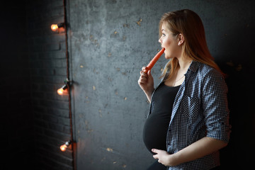 Pregnant young beautiful girl on the ninth month