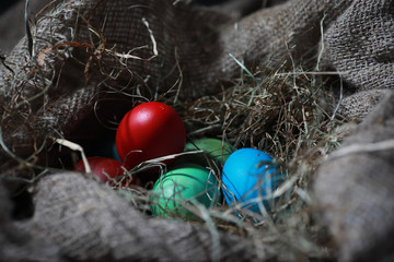 Easter painted eggs on burlap