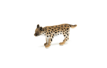 Toy lynx on white background