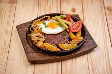 beef cutlet with baked potato