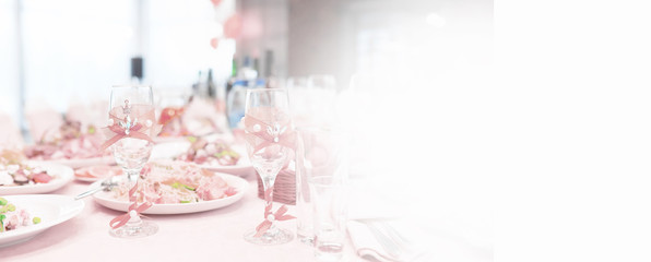 Glasses on the table in the restaurant. Table setting.