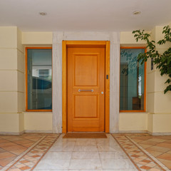 contemporary apartment building main entrance wooden door