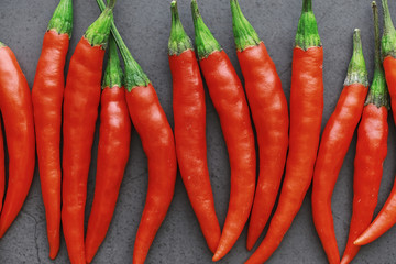 Hot red pepper. Chilean pepper on a black.