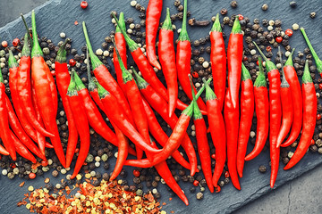 Hot red pepper. Chilean pepper on a black.