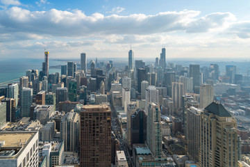 Fototapeta na wymiar Beautiful scenic view of business district of Chicago loop with blue skyline in sunny day. Panoramic view aerial top view or drone architecture view of city. Famous attraction in Chicago, USA.