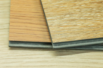 PVC Polymer Vinyl sample for customers to choose the floor design within the copy space.