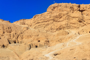 Fototapeta premium Tombs in mountains near Mortuary Temple of Hatshepsut in Luxor, Egypt