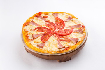 Pizza with tomatoes and Ham isolated on white background