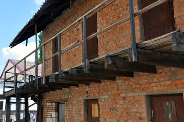 warehouse building with individual rooms in the courtyard of a residential building. City