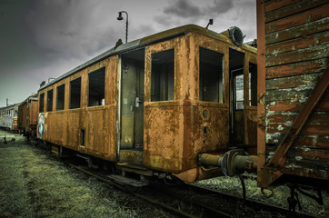 Fototapeta na wymiar Old railway carriage - train cemetery