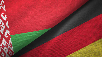 Belarus and Germany two flags textile cloth, fabric texture
