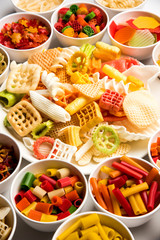 Snack pellets are non-expanded products made with raw materials like cereals, potatoes or vegetable powders, later processed using frying, hot air baking. multicoloured / shaped ready-to-eat snacks