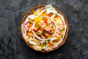 Snack pellets are non-expanded products made with raw materials like cereals, potatoes or vegetable powders, later processed using frying, hot air baking. multicoloured / shaped ready-to-eat snacks