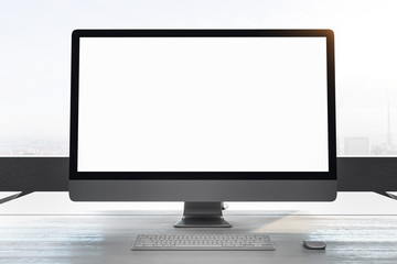Designer desktop with empty white computer