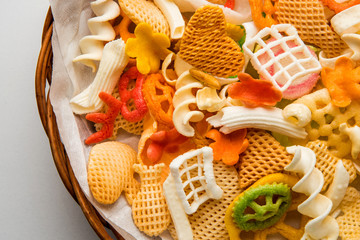 Snack pellets are non-expanded products made with raw materials like cereals, potatoes or vegetable powders, later processed using frying, hot air baking. multicoloured / shaped ready-to-eat snacks