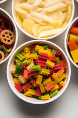 Snack pellets are non-expanded products made with raw materials like cereals, potatoes or vegetable powders, later processed using frying, hot air baking. multicoloured / shaped ready-to-eat snacks