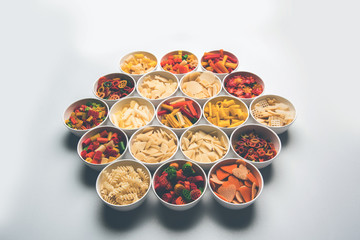 Snack pellets are non-expanded products made with raw materials like cereals, potatoes or vegetable powders, later processed using frying, hot air baking. multicoloured / shaped ready-to-eat snacks