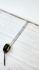 Tape measure for home renovation and laminate flooring.