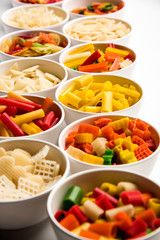Snack pellets are non-expanded products made with raw materials like cereals, potatoes or vegetable powders, later processed using frying, hot air baking. multicoloured / shaped ready-to-eat snacks